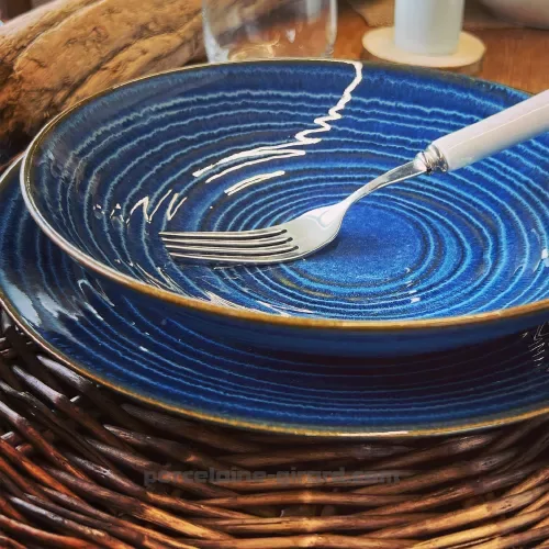 ASSIETTE CALOTTE MALO 22CM DE COULEUR BLEUE EN GRES/